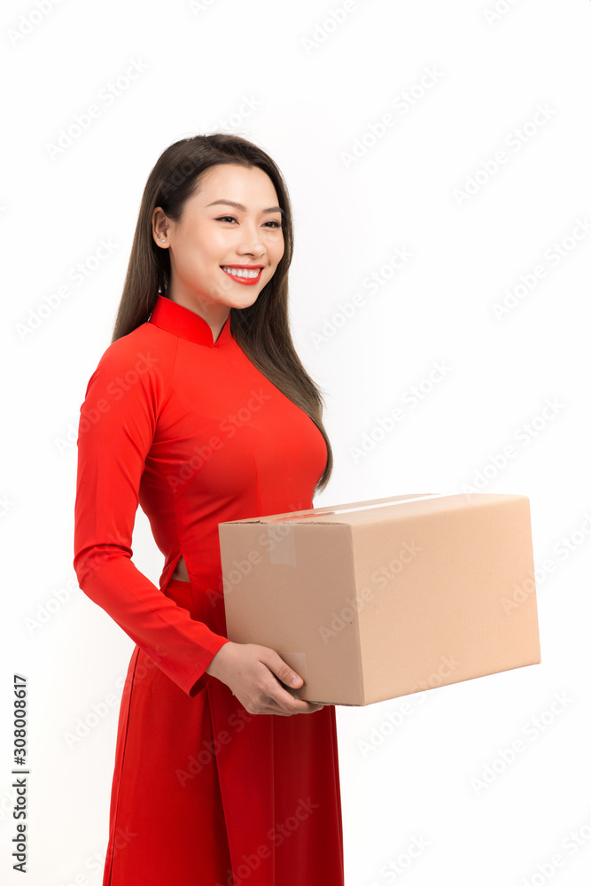 Asian girl with Vietnamese traditional dress holding gift box, Lunar New Year Greetings Asian girl with Vietnamese traditional dress holding gift box, Lunar New Year Greetings