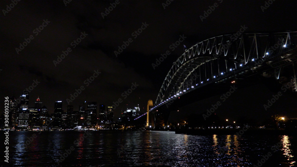 Sydney harbour bridge and city at night