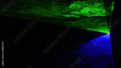 Green and blue disco laser in a light show