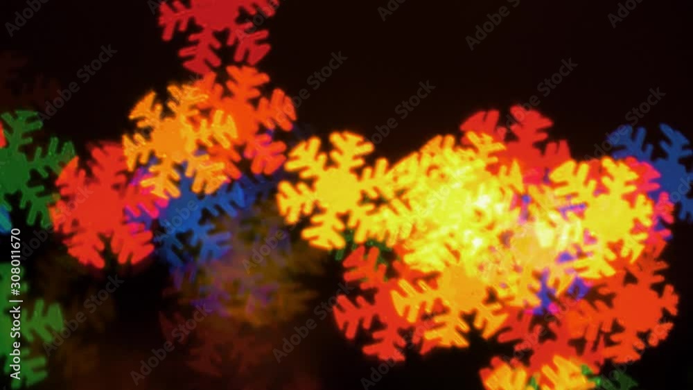 Beautiful snowflake shape bokeh from flashing LED lights, Christmas, winter, holiday or glamour party background concept, copyspace Beautiful snowflake shape bokeh from flashing LED lights, Christmas, winter, holiday or glamour party background concept, copyspace
