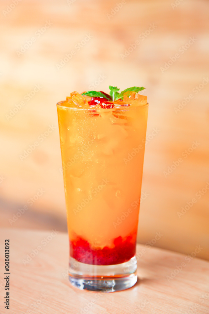 Fresh orange juice soda with strawberry syrup Fresh orange juice soda with strawberry syrup