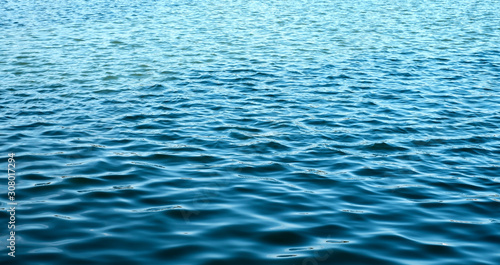 ripples on the marine blue water background