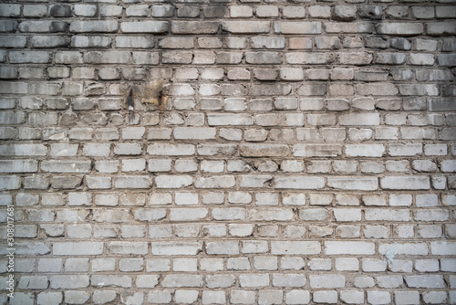 Shabby dirty light brick wall texture