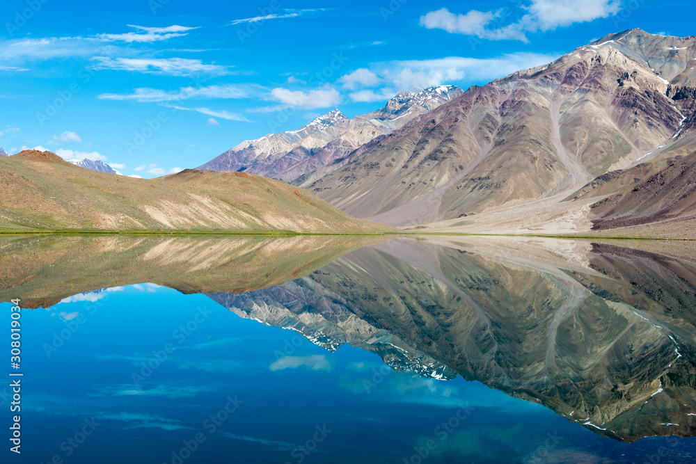 Fototapeta premium Himachal Pradesh, India - Sep 04 2019 - Chandra Taal (Moon Lake) in Lahaul and Spiti, Himachal Pradesh, India. It is part of Ramsar Convention - Chandertal Wetland.