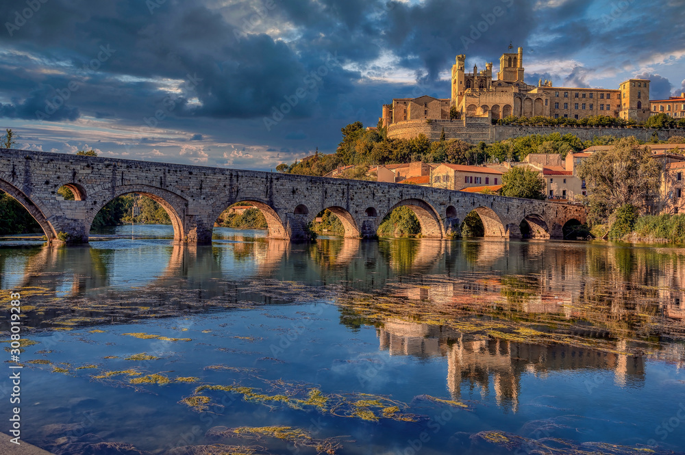 The Old Bridge (Pont vieux) at Beziers and the St. Nazaire Cathedral, France