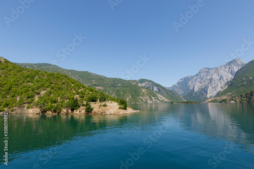 Beautiful landscape with mountains and green forests on a boat trip on the Komani lake in the dinaric alps of Albania © Fredy Thürig
