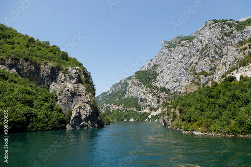 Beautiful landscape with mountains and green forests on a boat trip on the Komani lake in the dinaric alps of Albania © Fredy Thürig