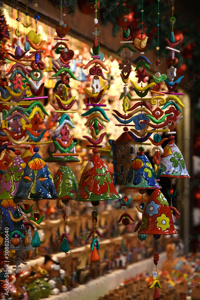 Florence, December 2019: Handmade Christmas decorations at Christmas market in Piazza Santa Croce in the centre of Florence City. Italy Florence, December 2019: Handmade Christmas decorations at Christmas market in Piazza Santa Croce in the centre of Florence City. Italy