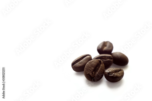 Coffee beans on a white background. Close-up