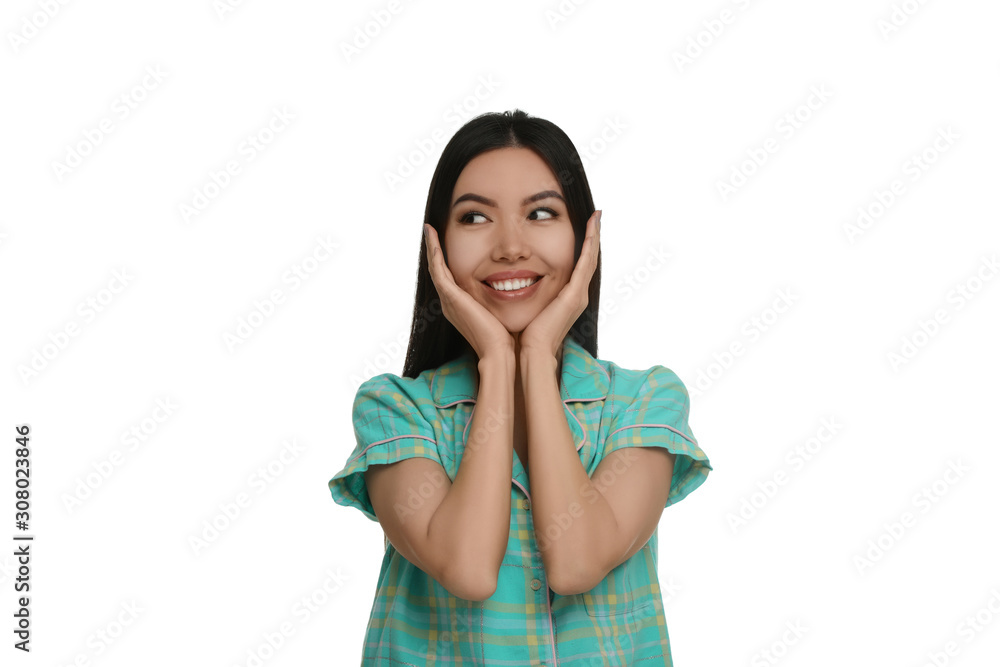 Beautiful Asian woman wearing pajamas on white background. Bedtime Beautiful Asian woman wearing pajamas on white background. Bedtime