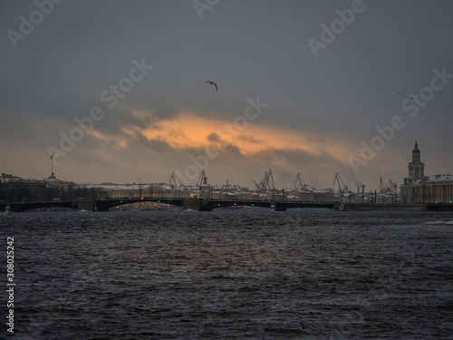 Dark cloudy landscape with a view of St. Petersburg.