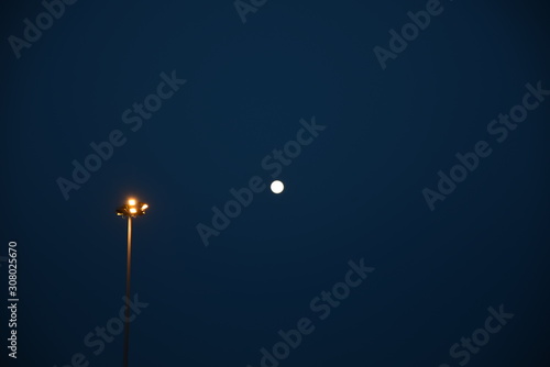 Night Sky With Moon and Lamp