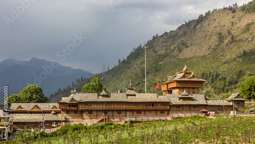 The ancient Bhimakali temple surrounded by Himalayan mountains in the village of Sarahan in HImachal Pradesh, India.