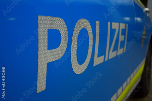 The word Polizei (police) on a german police car.