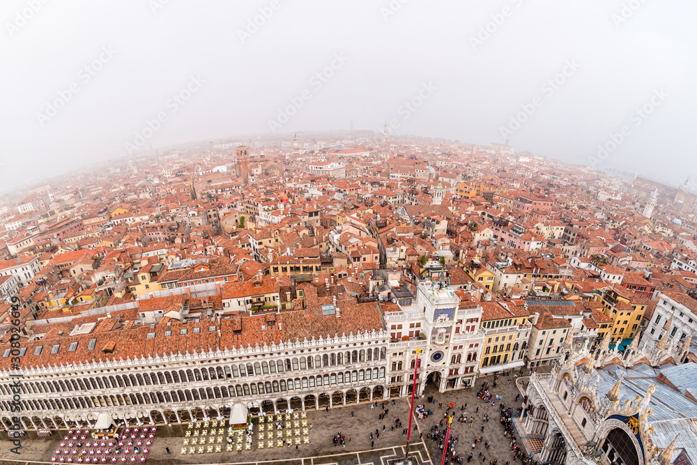 Foggy view from the top of Campanile di San Marco in the morning. Venice, Italy