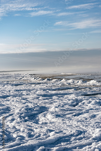 Snowy coast of Baltic sea in winter.