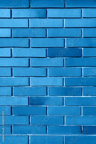 Blue background from brick wall texture pattern, wallpaper design template. © IrynaV