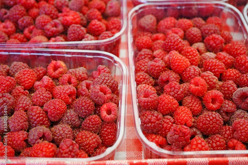 Fresh raspberries at a farmers market Fresh raspberries at a farmers market