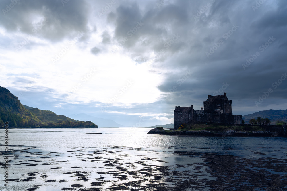 Eilean Donan castle blue sky sunset clouds Eilean Donan castle blue sky sunset clouds