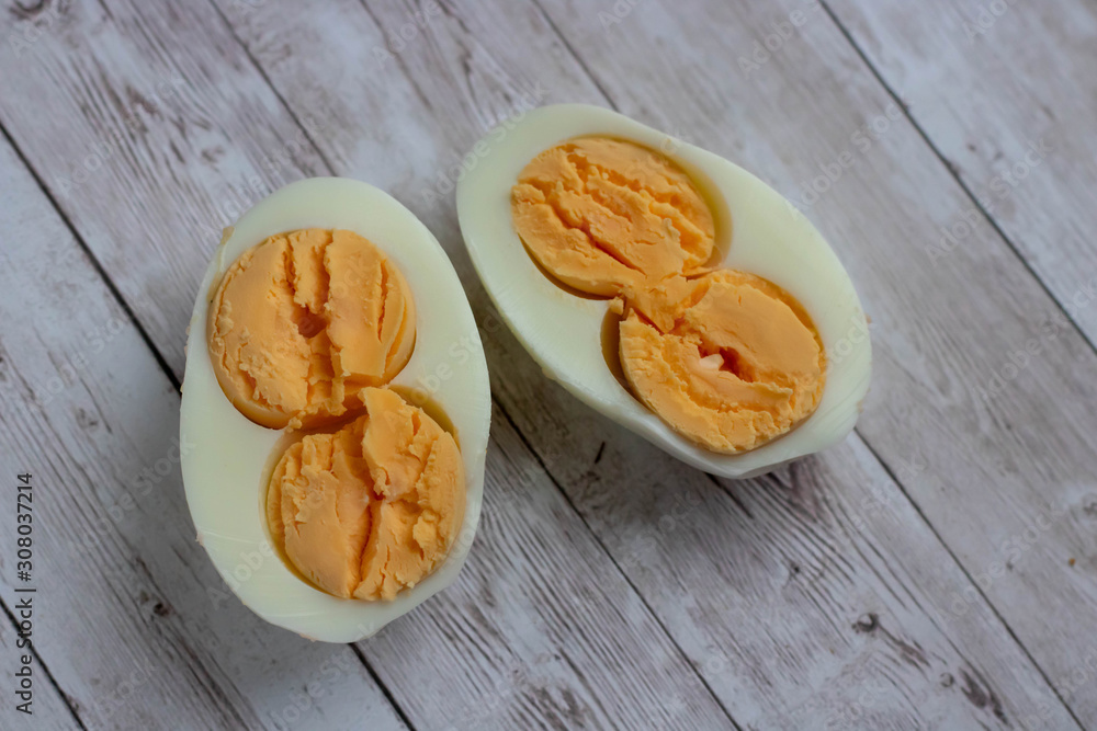 boiled egg isolated on wood background cutout boiled egg isolated on wood background cutout