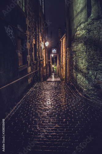 One of Edinburgh close street by night off the Royal Mile.
