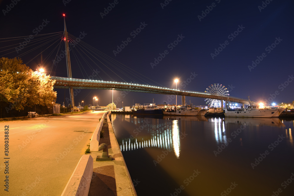 Fototapeta premium Ponte del Mare by Night in the City Illuminated by Lamps