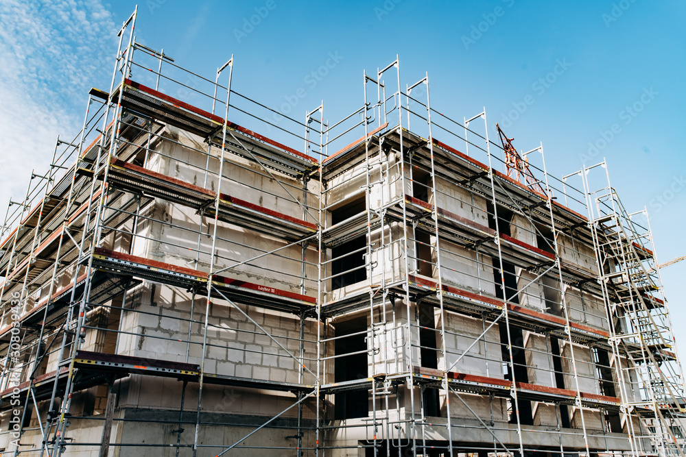 Construction of a multi-storey building. Construction of a multi-storey building.