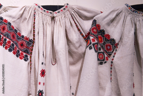 Fragment of Ukrainian national embroidery on the sleeves of the dress. Vyshyvanka - ethnic clothing with embroidery patterns © Nikusha