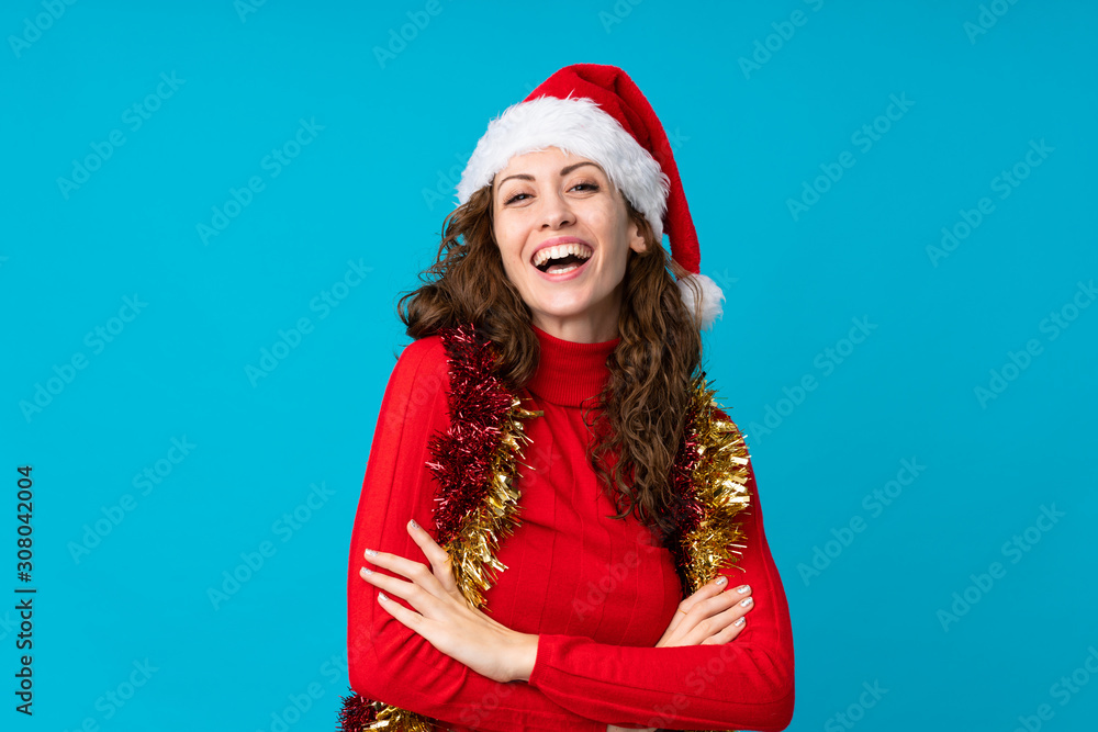 Girl with christmas hat over isolated background Girl with christmas hat over isolated background