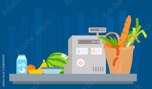Groceries and a cash register. Purchases check out. Vegetables, milk, fruits, bread, sausage.