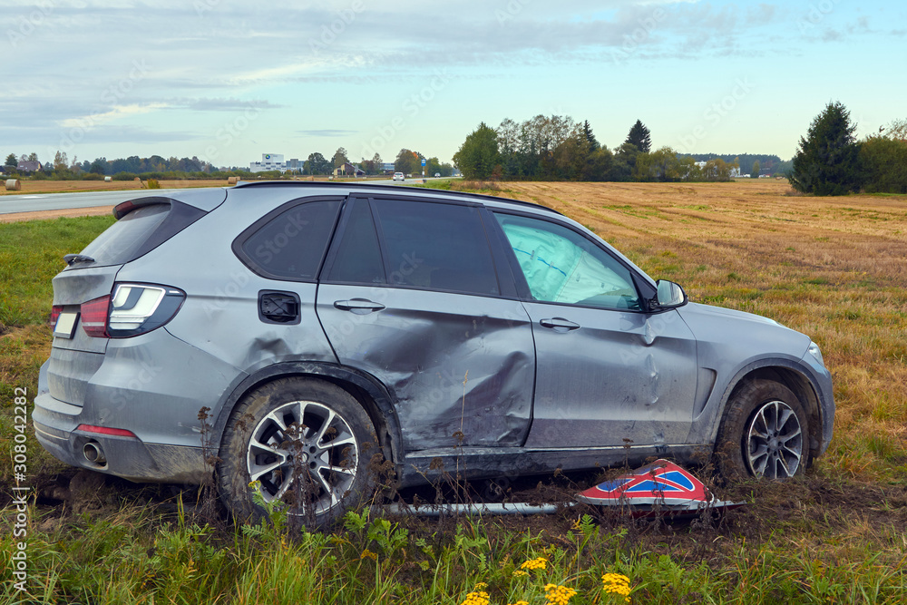 Damaged car after accident on a road Damaged car after accident on a road