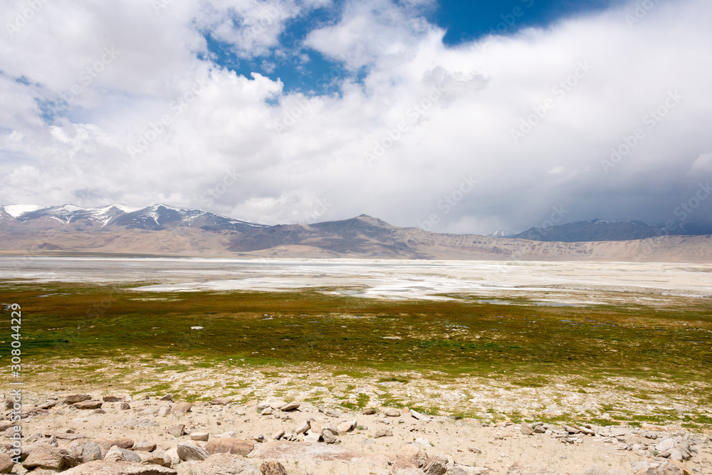 Ladakh, India - Jul 12 2019 - Tso Kar Lake in Ladakh, Jammu and Kashmir, India. is a fluctuating salt lake situated in the Rupshu Plateau and valley in the southern part of Ladakh in India. Ladakh, India - Jul 12 2019 - Tso Kar Lake in Ladakh, Jammu and Kashmir, India. is a fluctuating salt lake situated in the Rupshu Plateau and valley in the southern part of Ladakh in India.