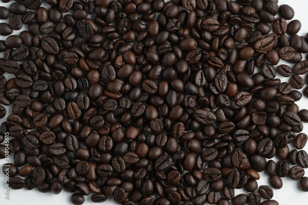 pile black coffee bean top view with white background pile black coffee bean top view with white background