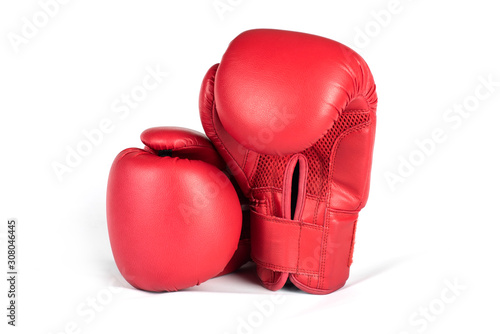 Red boxing gloves on a white background isolated with light shadow