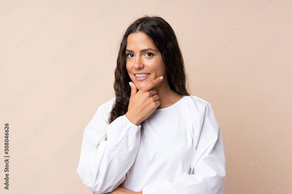 Young woman over isolated background laughing Young woman over isolated background laughing