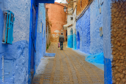 Typical beautiful moroccan architecture in Chefchaouen blue city medina in Morocco © Екатерина Спиридонов