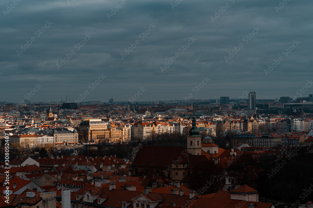 Beautiful View To The Cityscape of Prague, At Christmas Time and New Year. Sun ray on old town.
