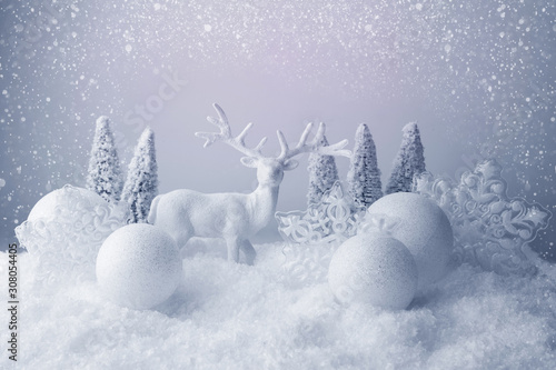 Christmas white balls, trees, deer and snowflake on abstract background