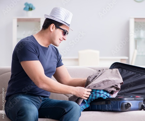 Man with hat preparing for summer vacation © Elnur