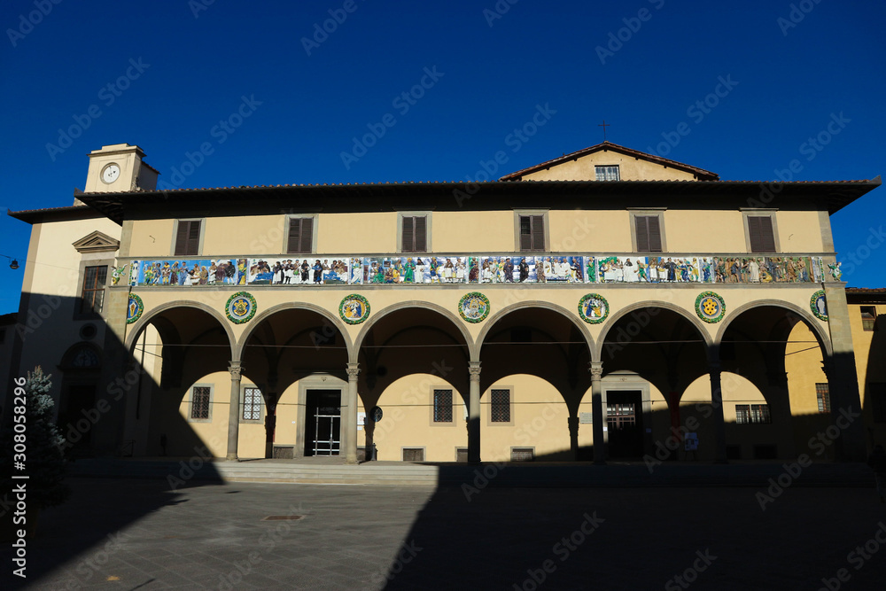 Beautiful building of medieval hospital del Ceppo in Pistoia, Tuscany, central Italy