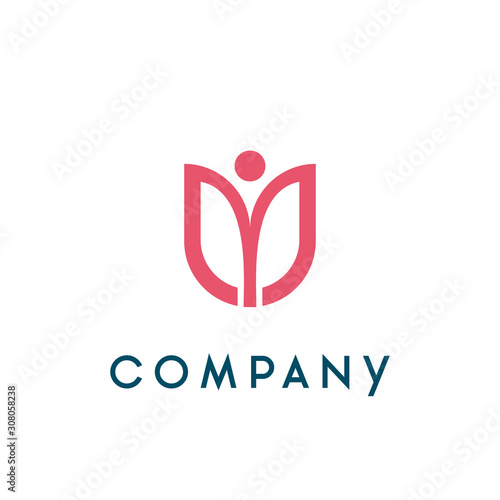 Fototapeta tulip flower with human silhouette concept design. beauty spa salon logo. healthy yoga logo. cosmetic brand logo.