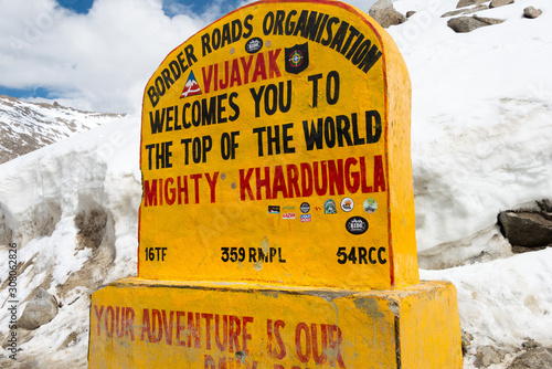 Ladakh, India - Jul 20 2019 - Monument of Khardung La Pass in Ladakh, Jammu and Kashmir, India. Khardung La is situated at an altitude of around 5359m above the sea level. photo