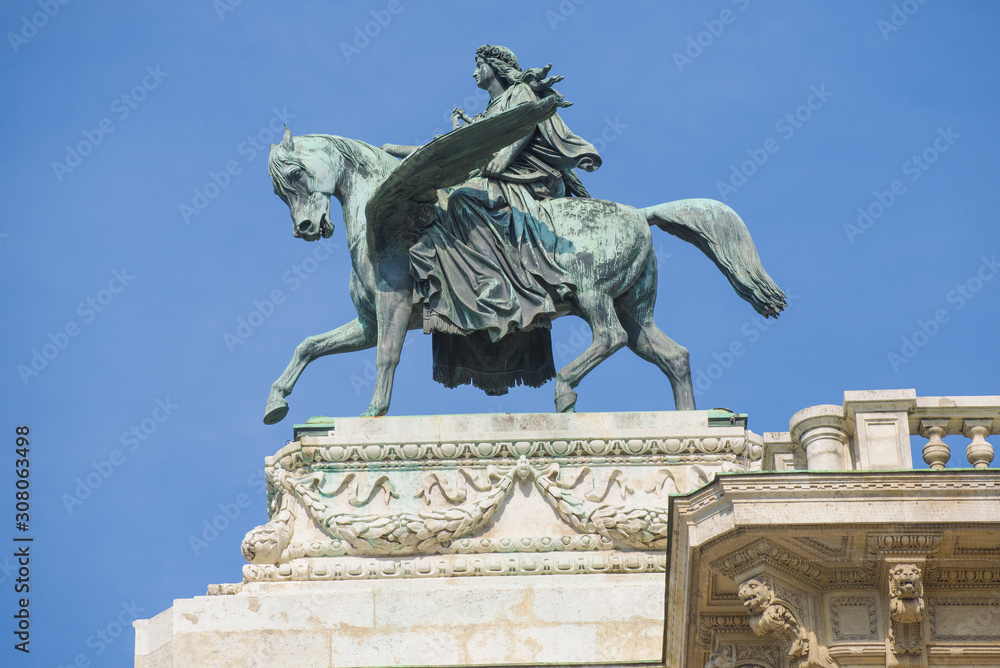 The old Sculpture of Apollo astride Pegasus (1869) on the roof of the Vienna State Opera. Vienna, Austria