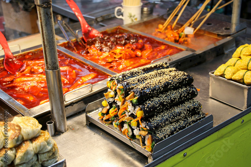 Gimbab, korean street food made from steamed rice and various other ingredients, rolled in dried seaweed.