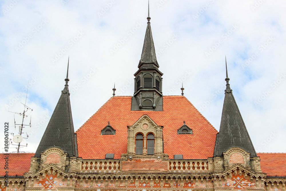 Fototapeta premium Close-up front view of the top and roof of a big old house. Bratislava, Slovakia.