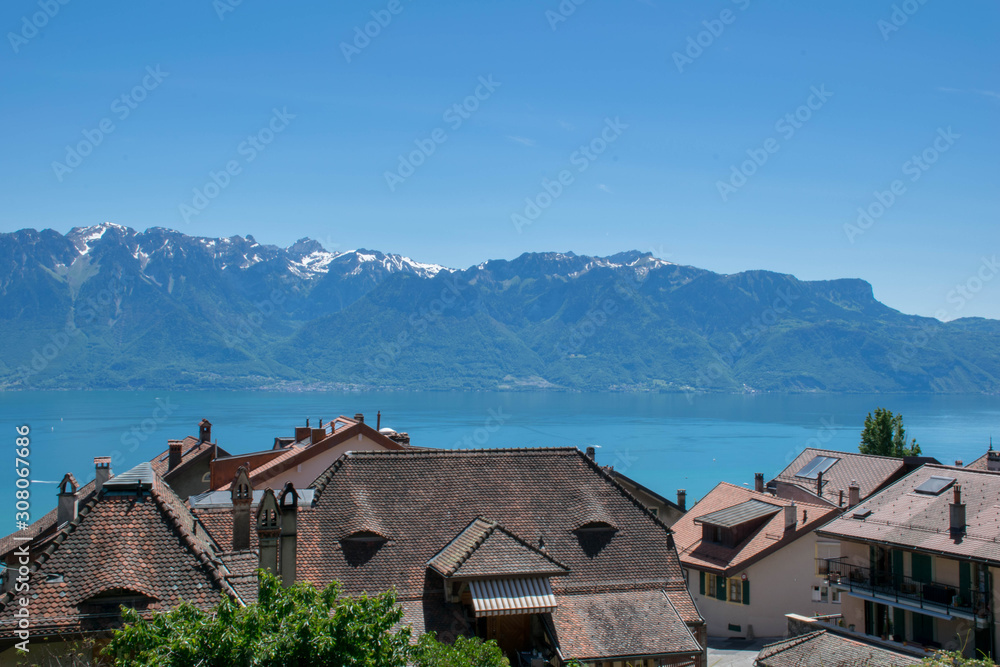 Roofs of village near Geneva Lake and Alps Mountains Roofs of village near Geneva Lake and Alps Mountains