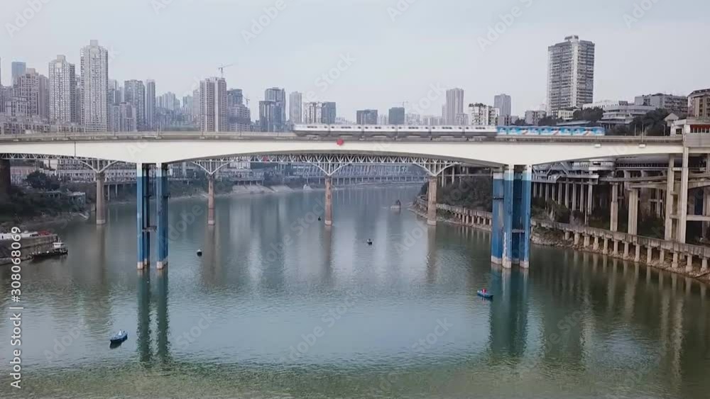 Aerial view of one of the largest cities in the world. Chongqing, China - Monorail metro in Chongqing, China. Aerial view of one of the largest cities in the world. Chongqing, China - Monorail metro in Chongqing, China.