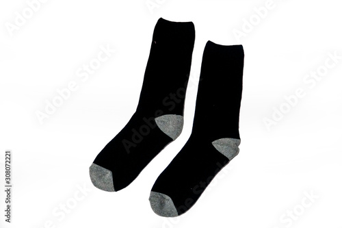 Pair of gray and black sock isolated white background