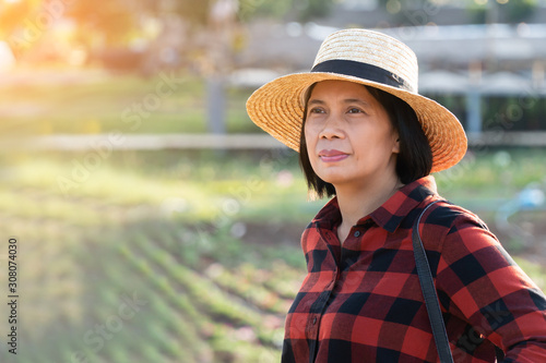 Tourist Asian Woman Stand in Country Farm, She Looking Forward to Beautiful Landscape