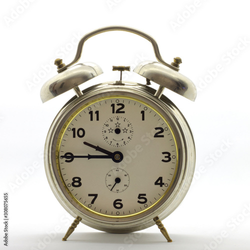 Old-style alarm clock, metal, it's quarter to ten.